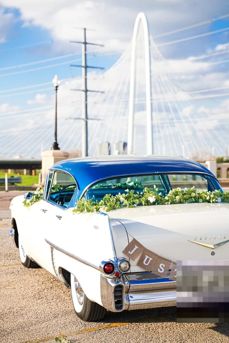 White and blue 1957 Cadillac Sedan DeVille classic car
