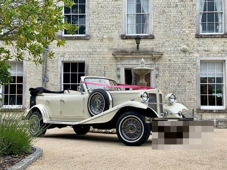 Ivory 1930s-style Beauford open tourer wedding car