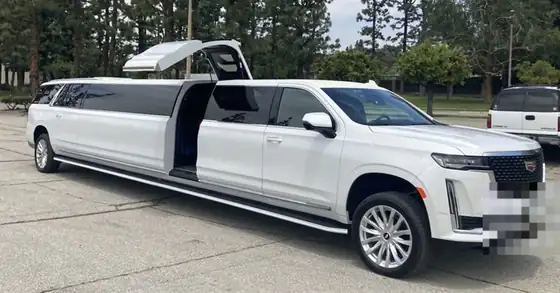 White Cadillac Escalade stretch limousine