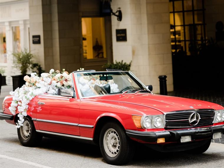 Red Mercedes-Benz 450SL classic convertible