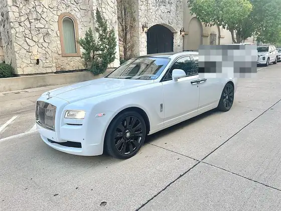 White Rolls-Royce Ghost luxury sedan